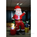 Papai Noel gigante inflável no sofá para decoração de Natal
